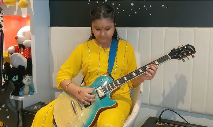 Garota de 9 anos toca TOOL na guitarra